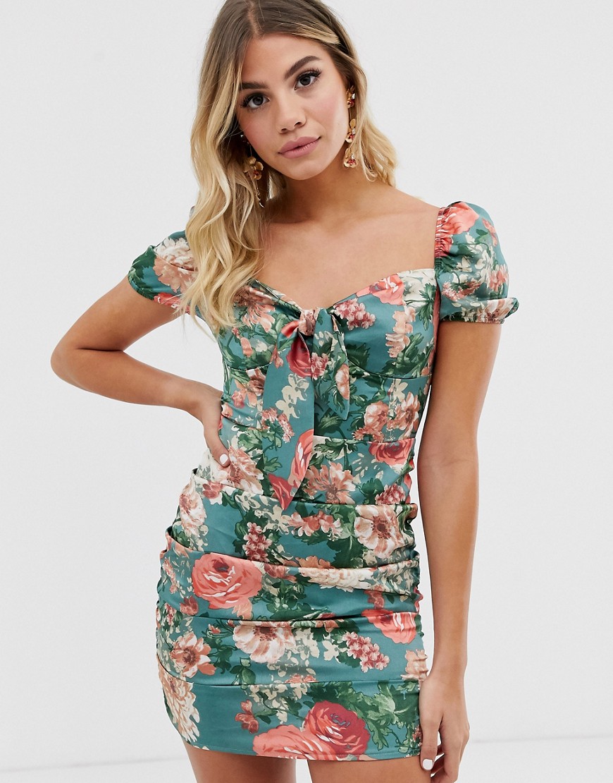 In The Style x Fashion Influx puff sleeved tie front mini dress in green floral
