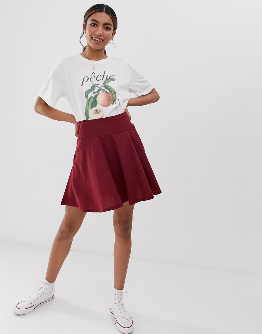 ASOS DESIGN mini skater skirt with drop pockets in texture