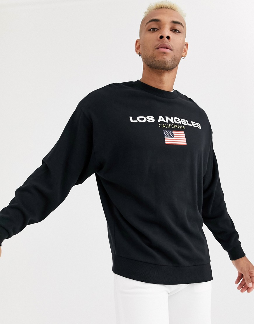 ASOS DESIGN oversized sweatshirt with Los Angeles text print in black