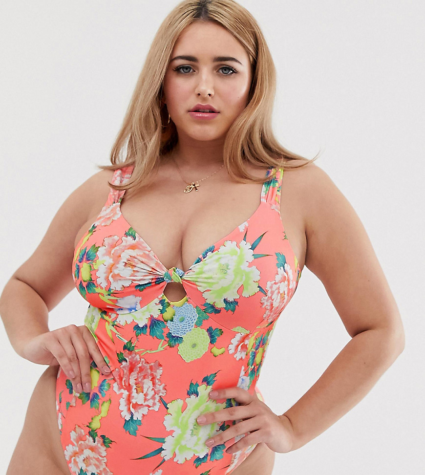 ASOS DESIGN curve knot front plunge swimsuit in washed neon floral print