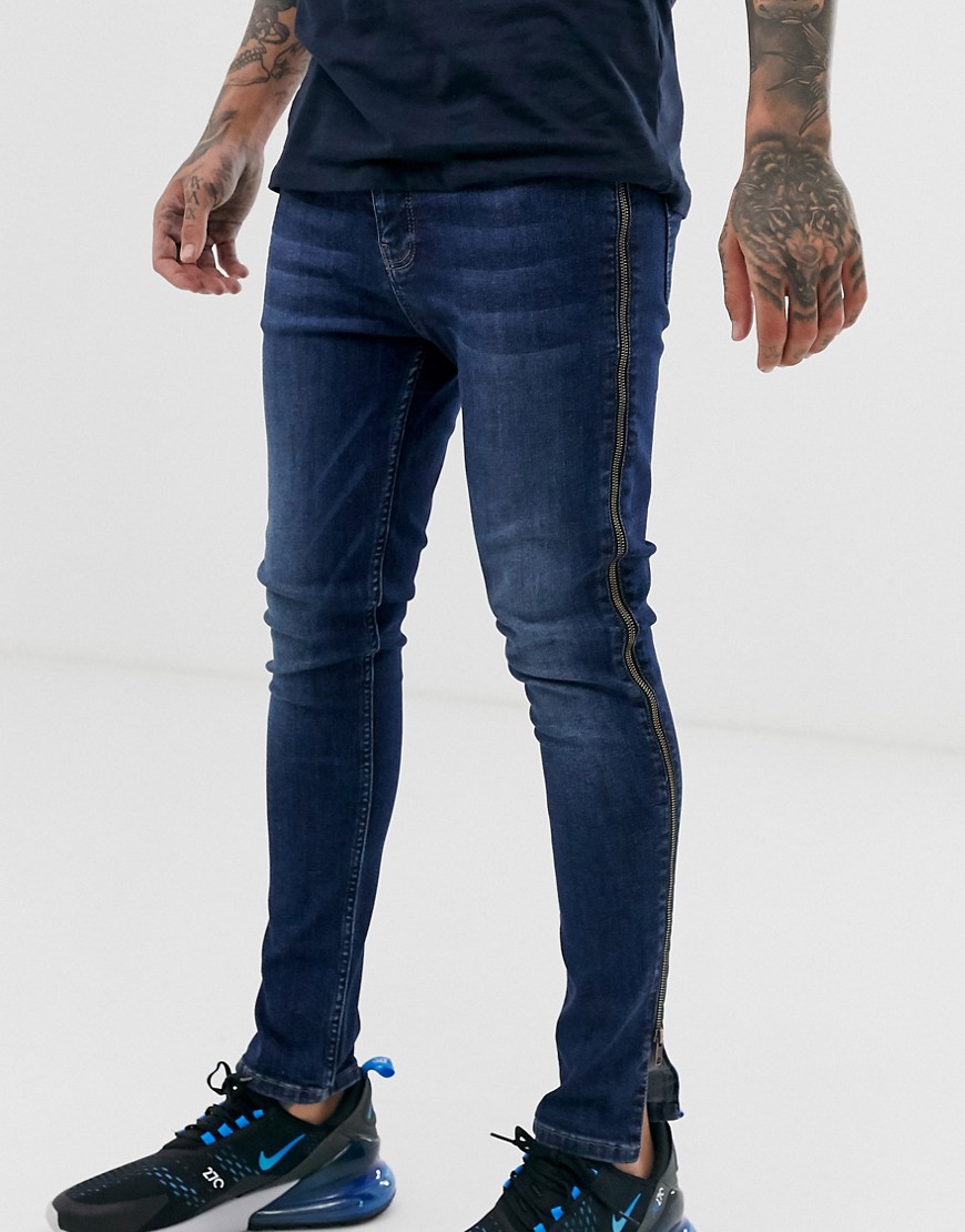 ASOS DESIGN spray on jeans in power stretch in dark wash blue with side zips
