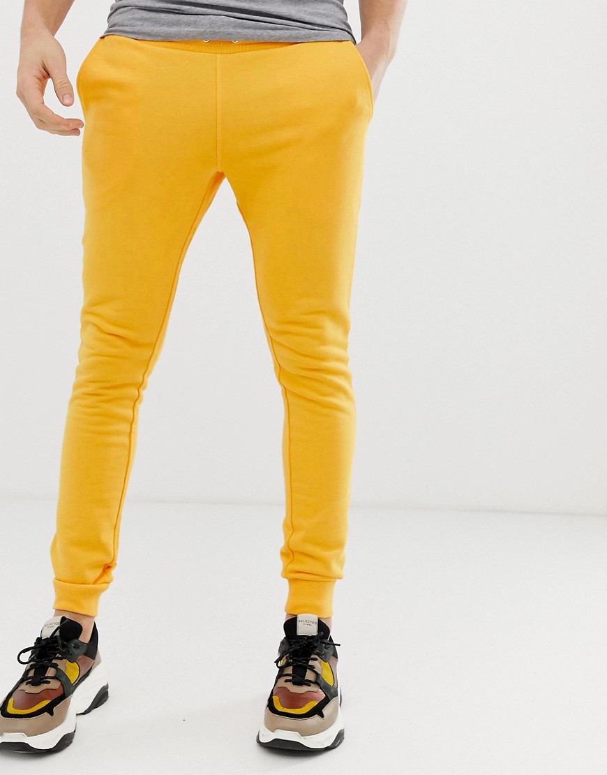 ASOS DESIGN super skinny joggers in yellow