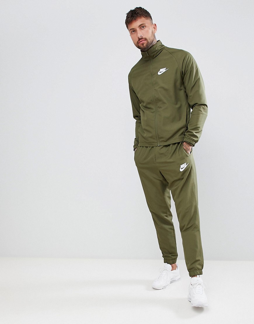 nike woven tracksuit green