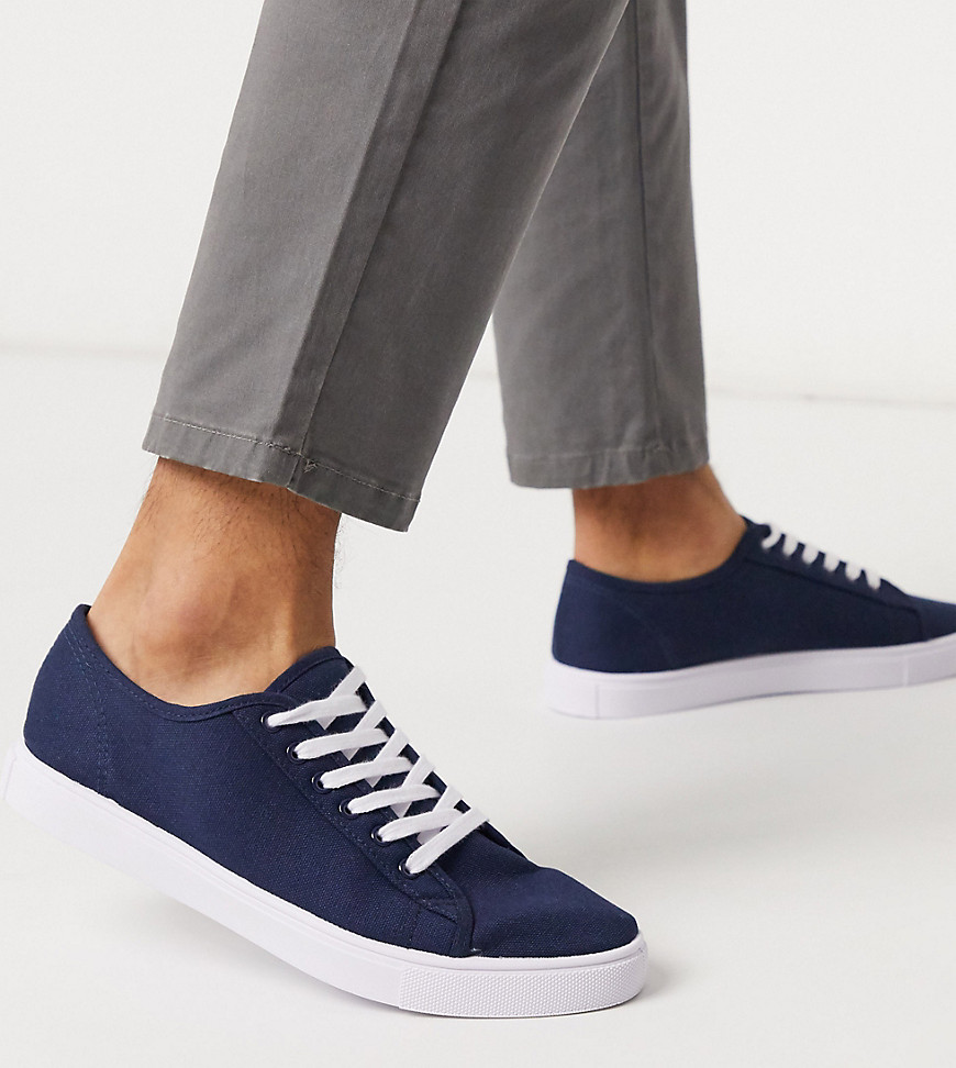 ASOS DESIGN Wide Fit trainers in navy canvas