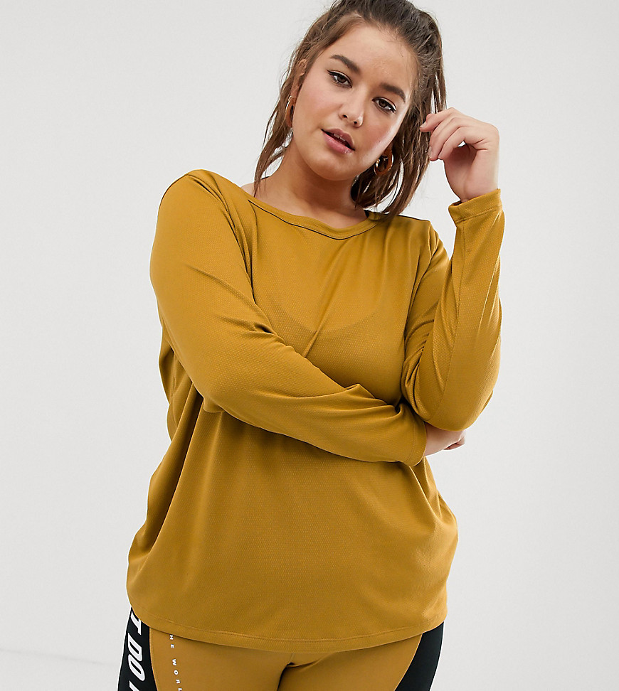 Nike Plus Training Long Sleeve Top In Gold