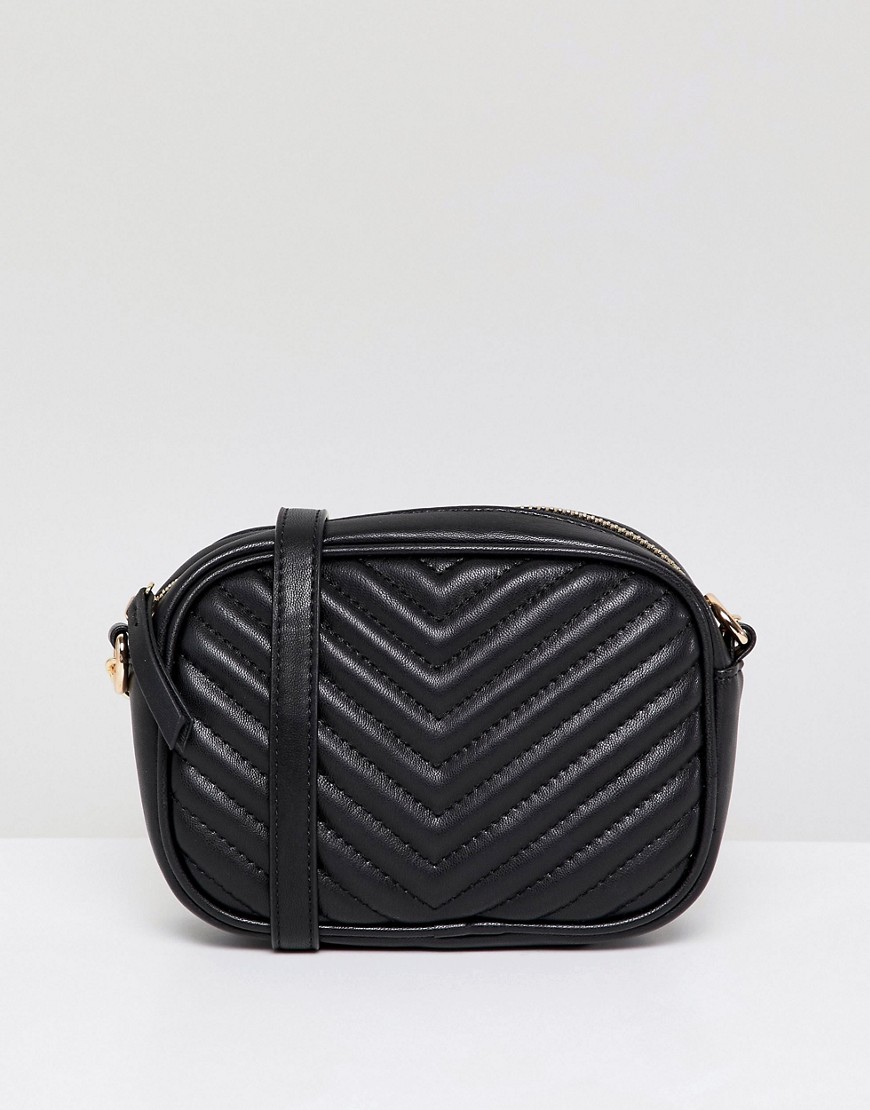 New Look quilted cross body bag in black - Black