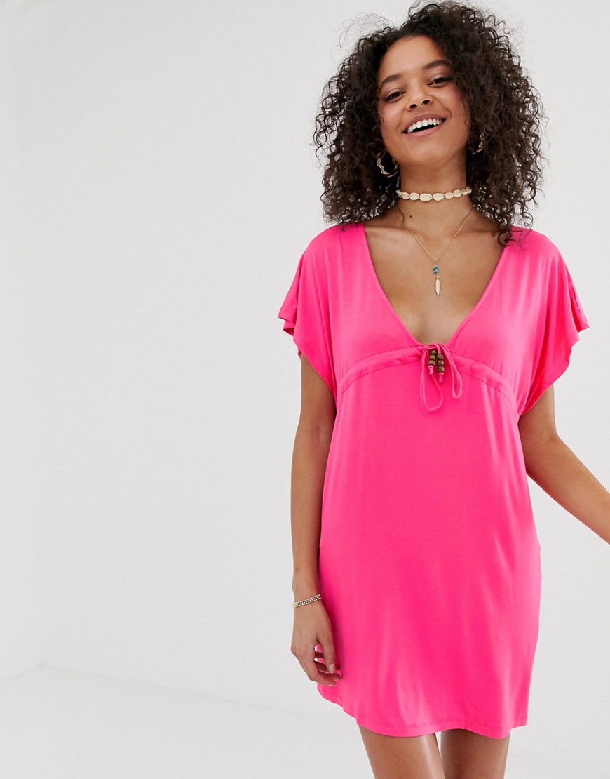 Pia Rossini plunge front beach dress in pink