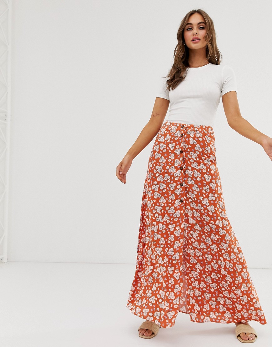 ASOS DESIGN button front maxi skirt in brown floral print