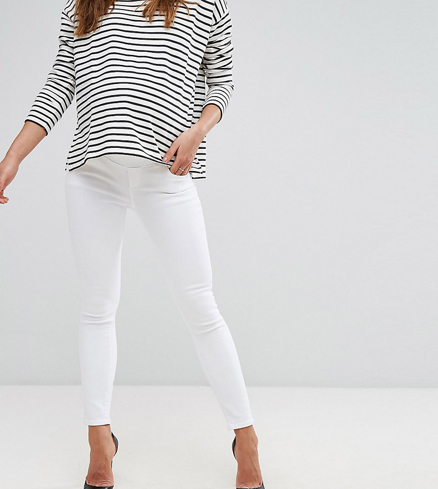 ASOS DESIGN Maternity Ridley high waisted skinny jeans in white with under the bump waistband