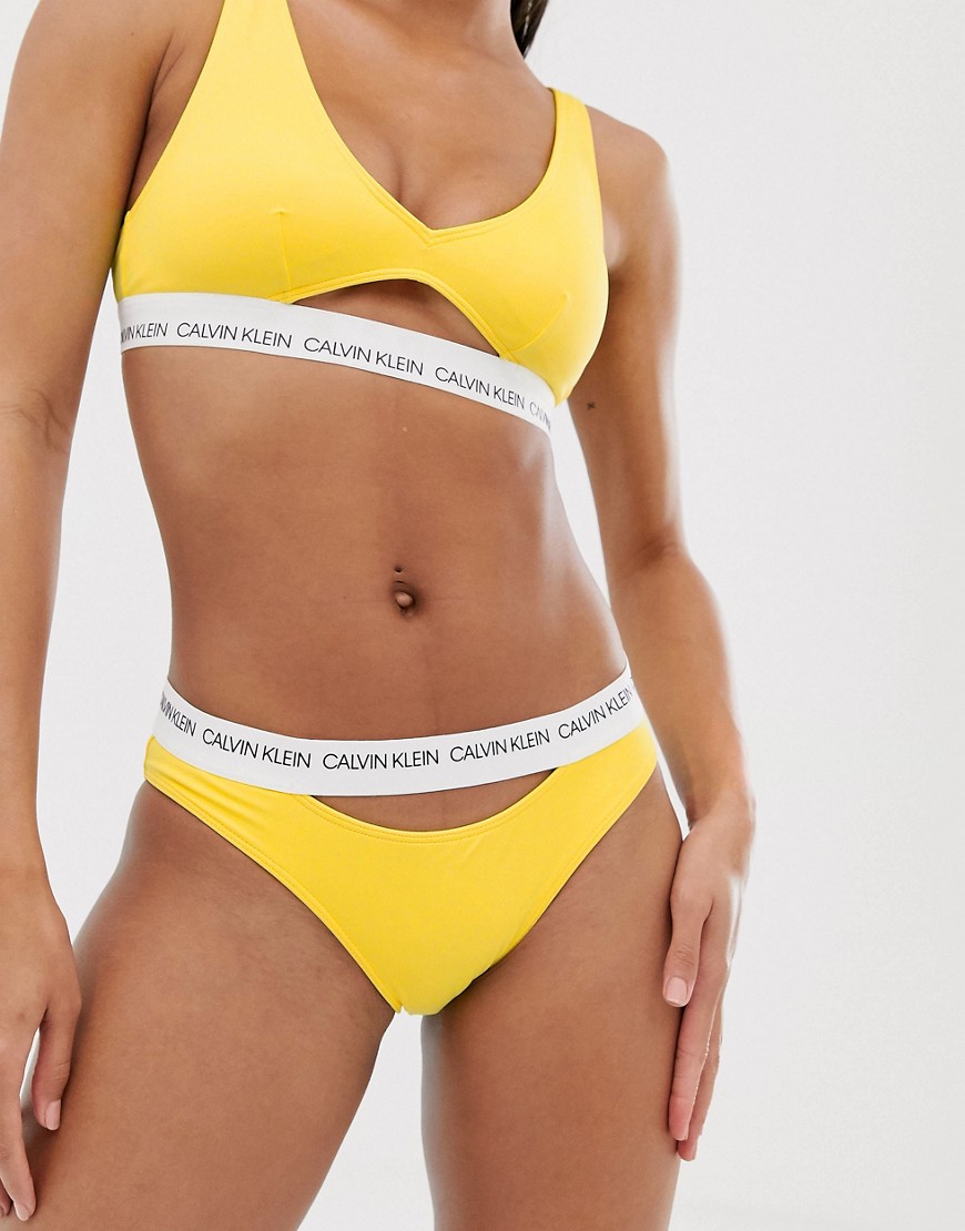 Calvin Klein cut out bikini bottom in yellow