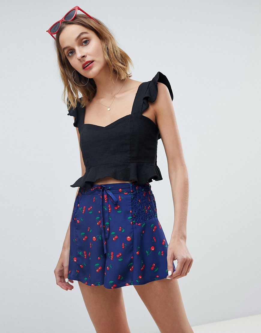 Neon Rose shorts in cherry print