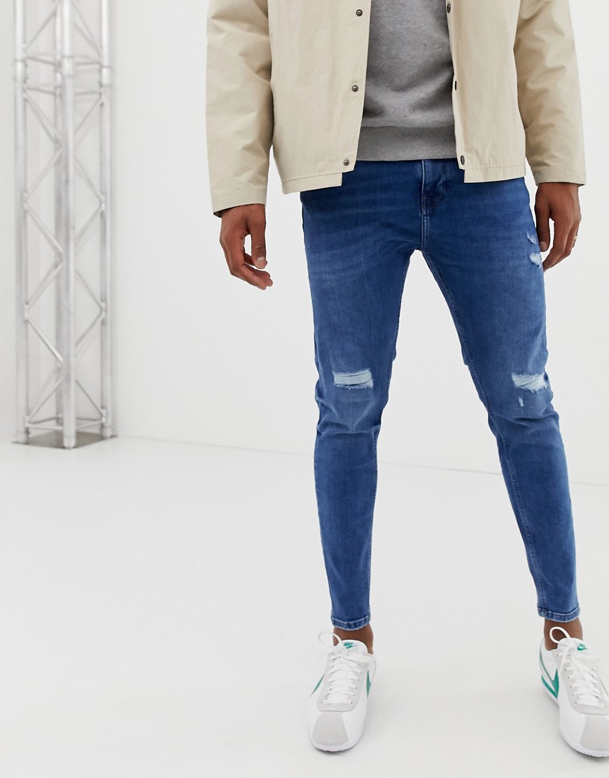 Pull&Bear tapered carrot fit jeans in mid blue