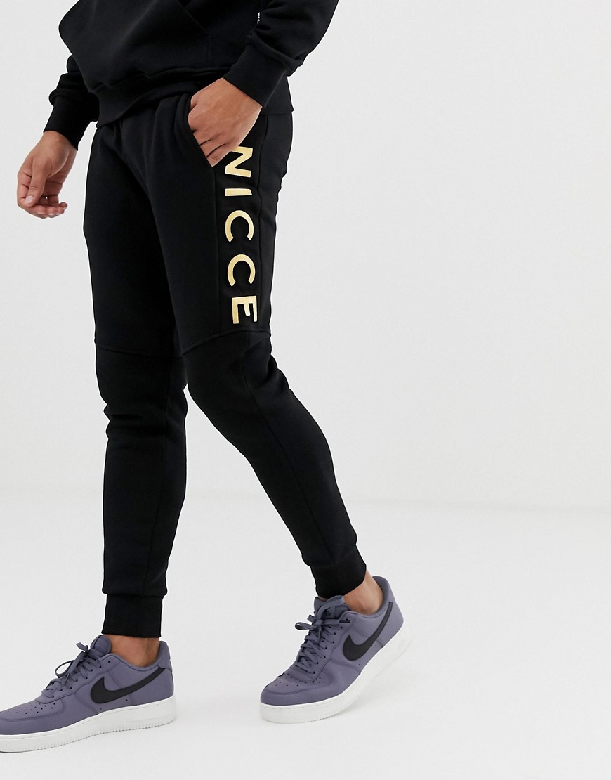 Nicce skinny joggers in black with gold logo