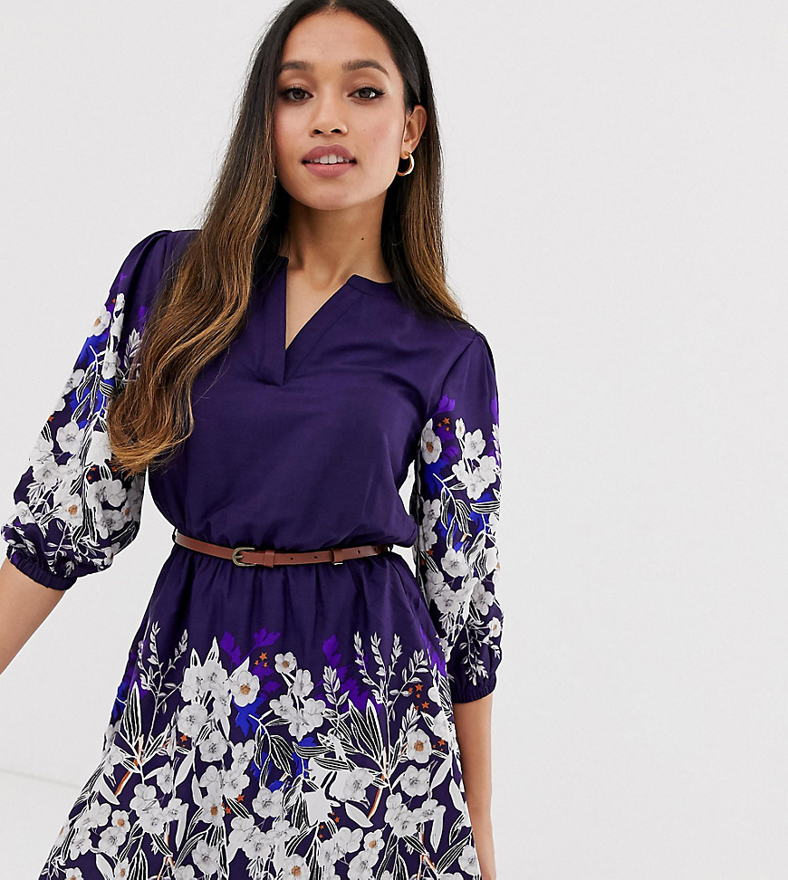 Yumi Petite belted dress with 3/4 sleeves in floral border print