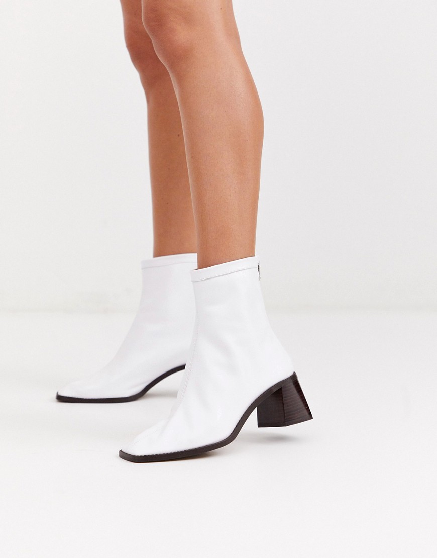 ASOS DESIGN Riverside leather mid heel sock boots in white