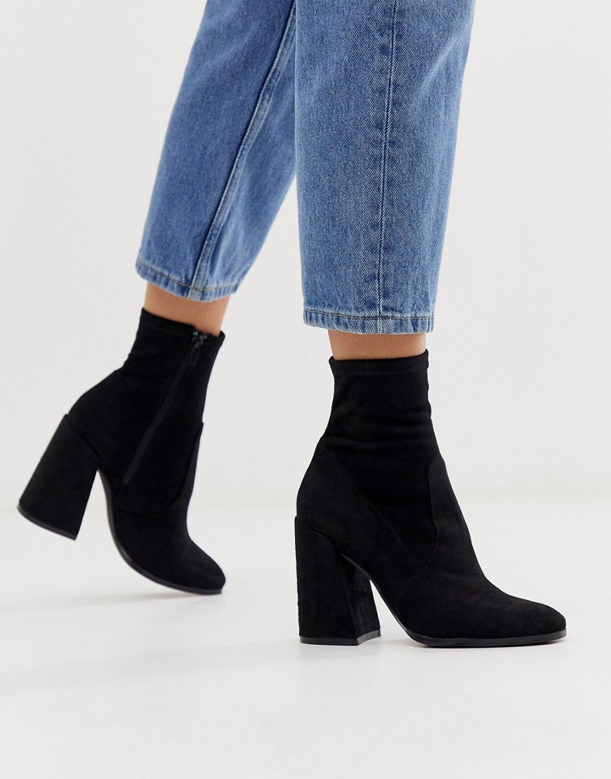 heeled black sock boots