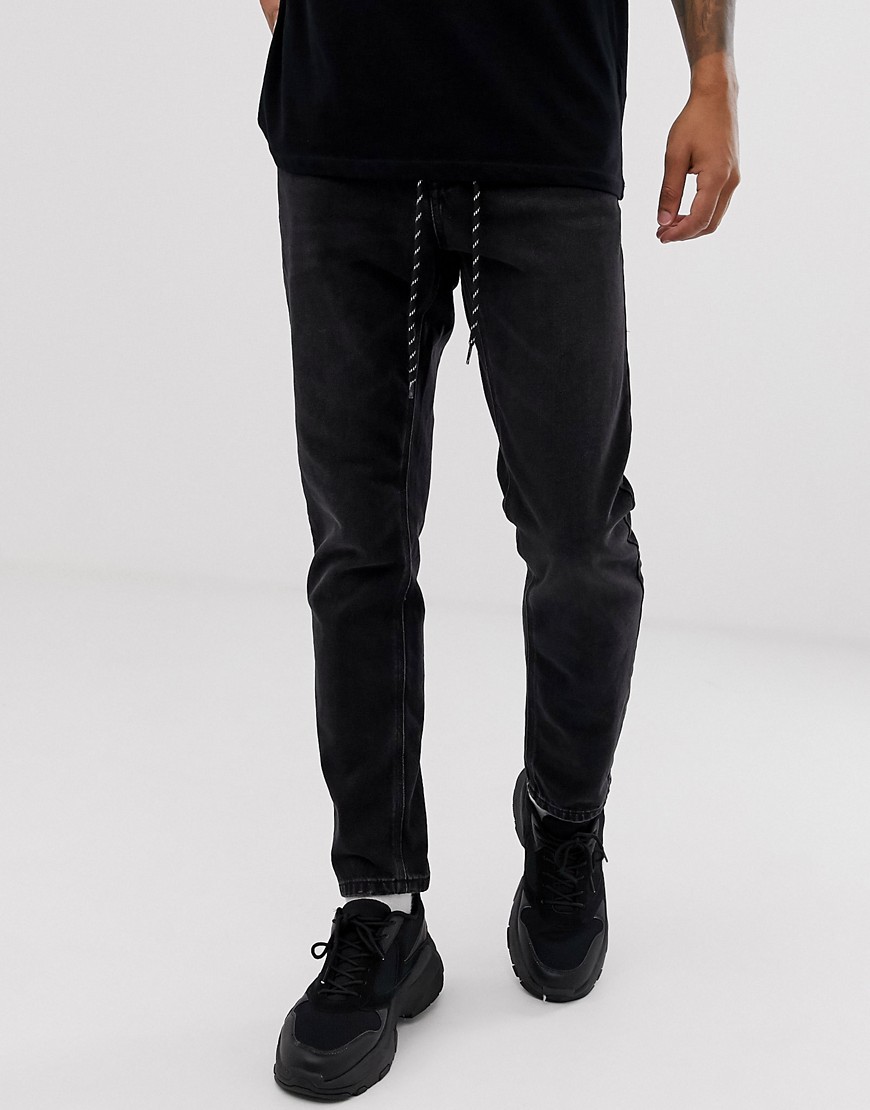 Topman tapered jeans in black wash