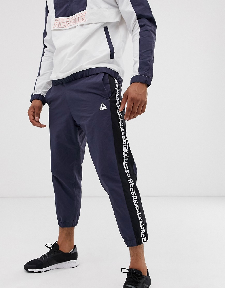 Reebok meet you there tapered tape joggers in navy