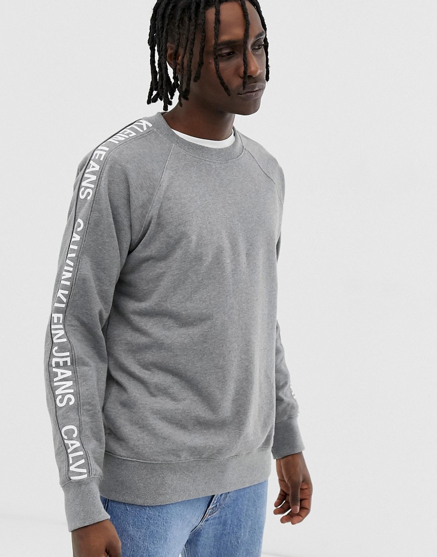 Calvin Klein Jeans side stripe logo crew neck sweatshirt in grey marl