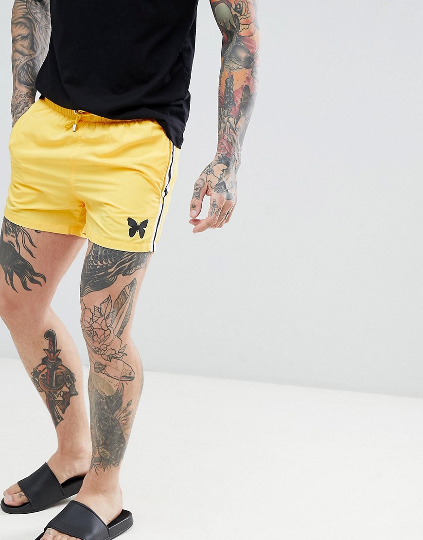 Good For Nothing swim shorts in yellow with side stripe