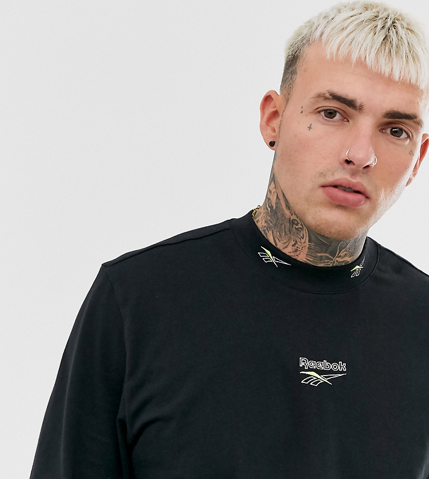 Reebok long sleeve t-shirt with neck logo detail in black Exclusive to Asos