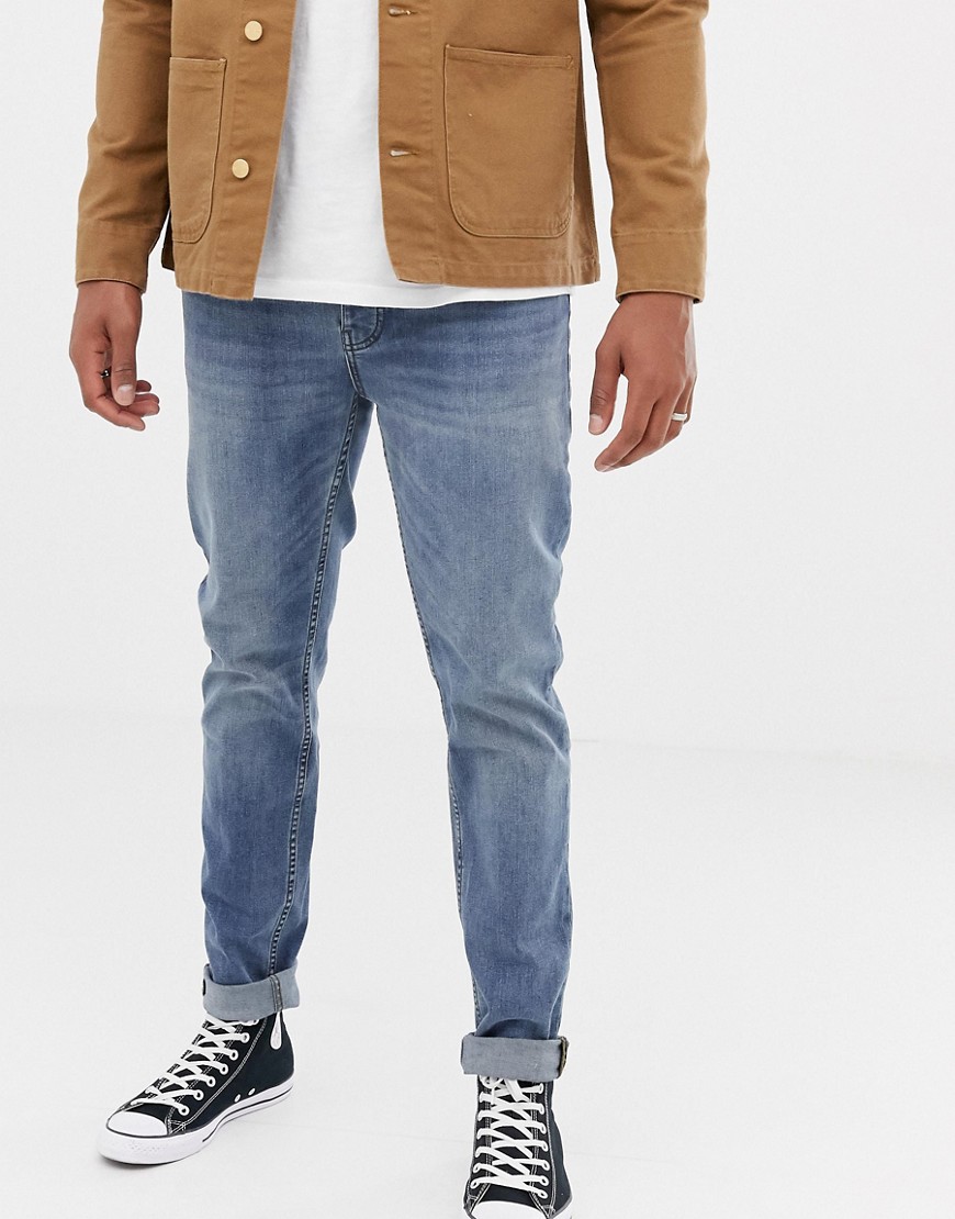 BOSS Taber tapered fit jeans in mid wash