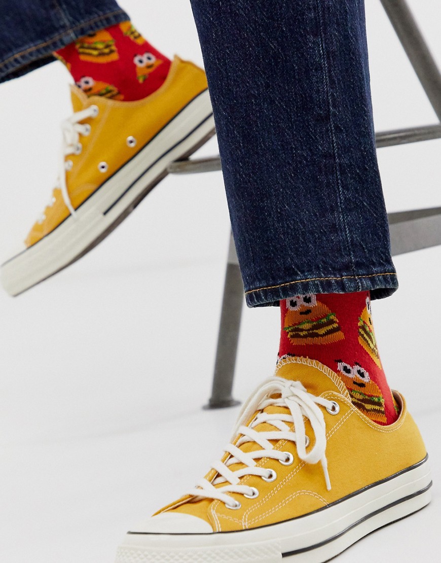 ASOS DESIGN red sock with all over burger face print