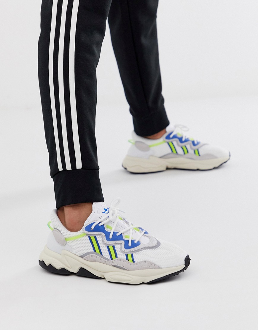 adidas Originals Ozweego trainers in white with multi three stripe