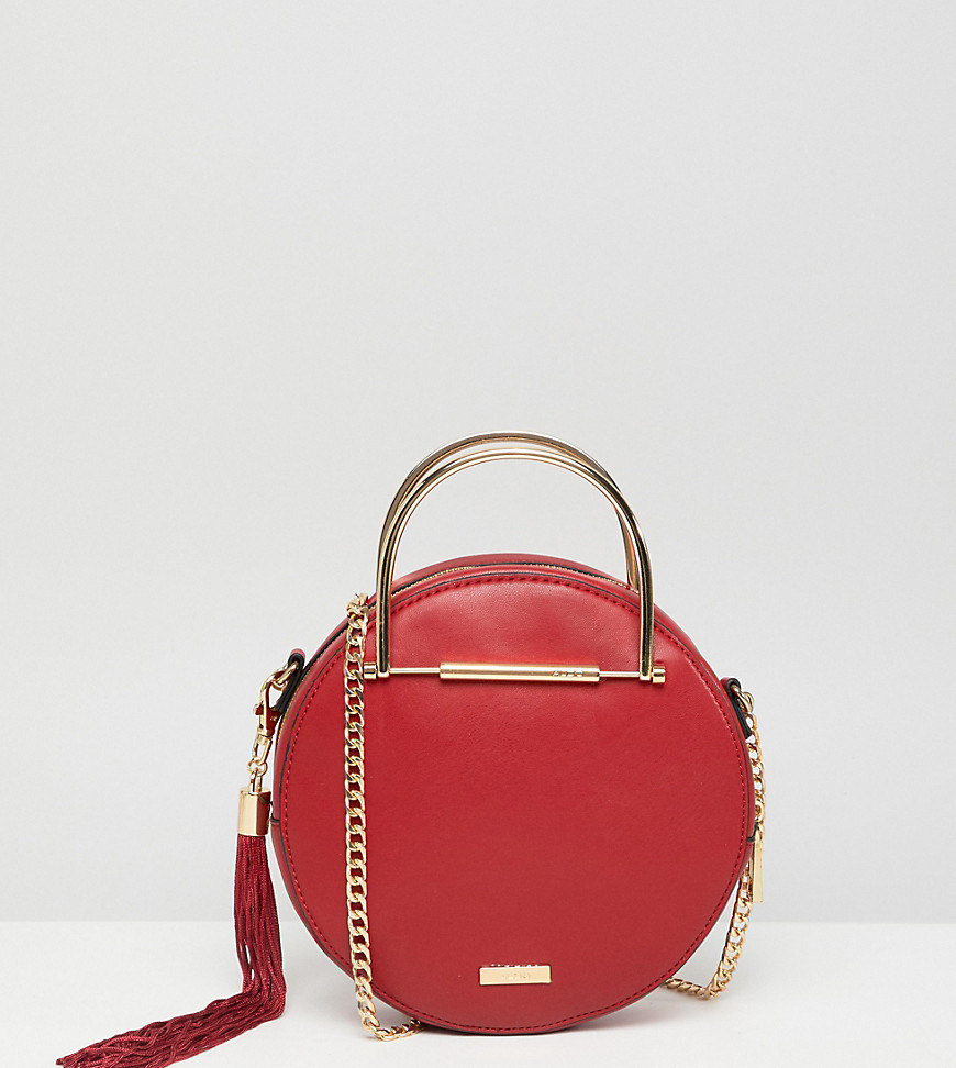 ALDO circle crossbody bag with gold top handle in red