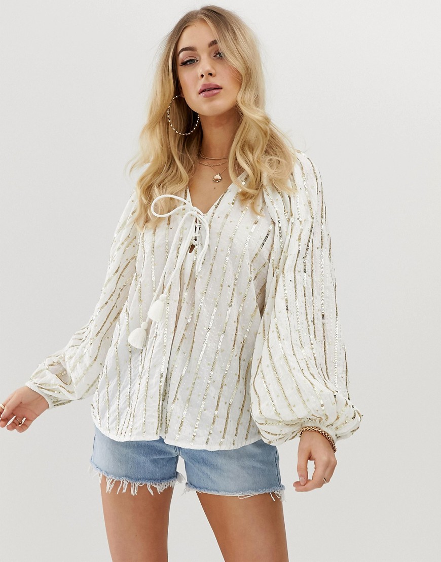 ASOS DESIGN long sleeve sequin stripe top with lace up detail