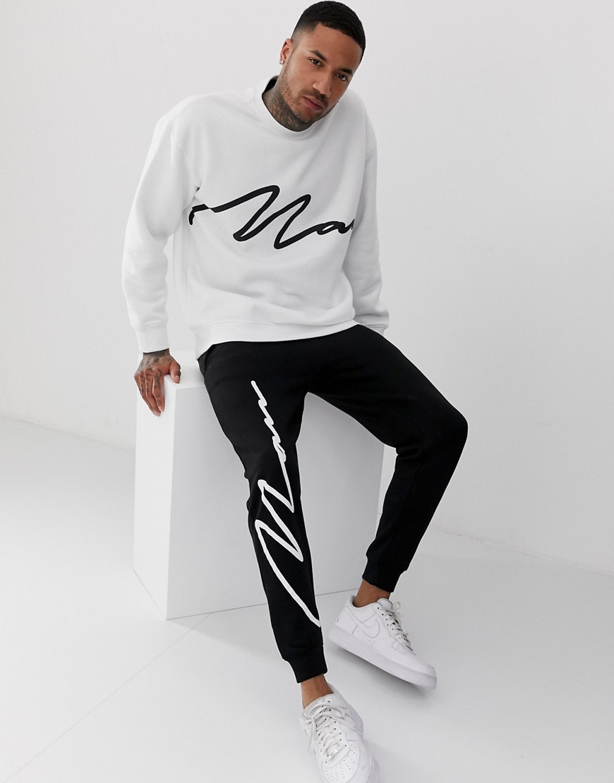 boohooMAN oversized tracksuit with man logo in mono