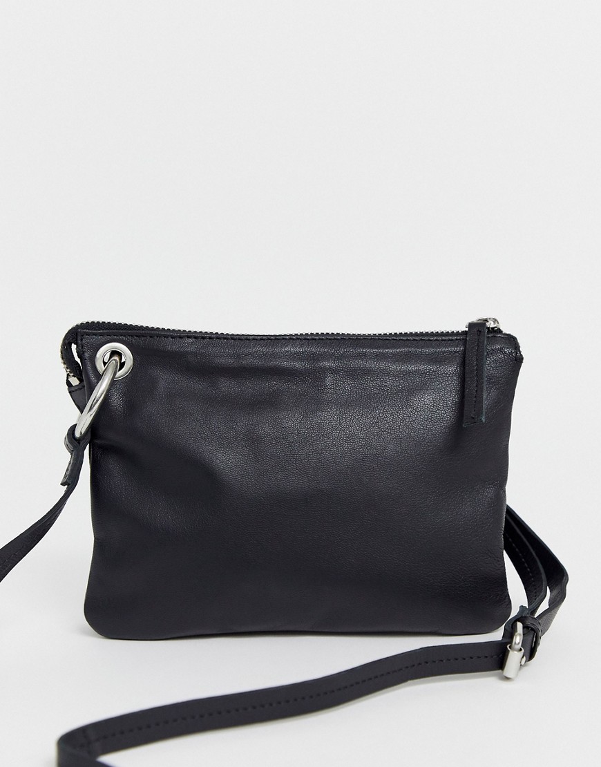ASOS DESIGN leather flat cross body bag with ring detail