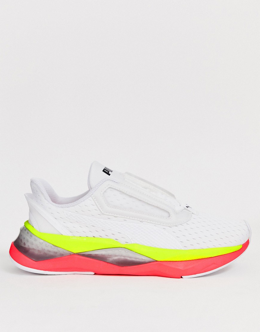 Puma Training Lqd Cell Shatter Xt Sneakers In White With Neon Pops