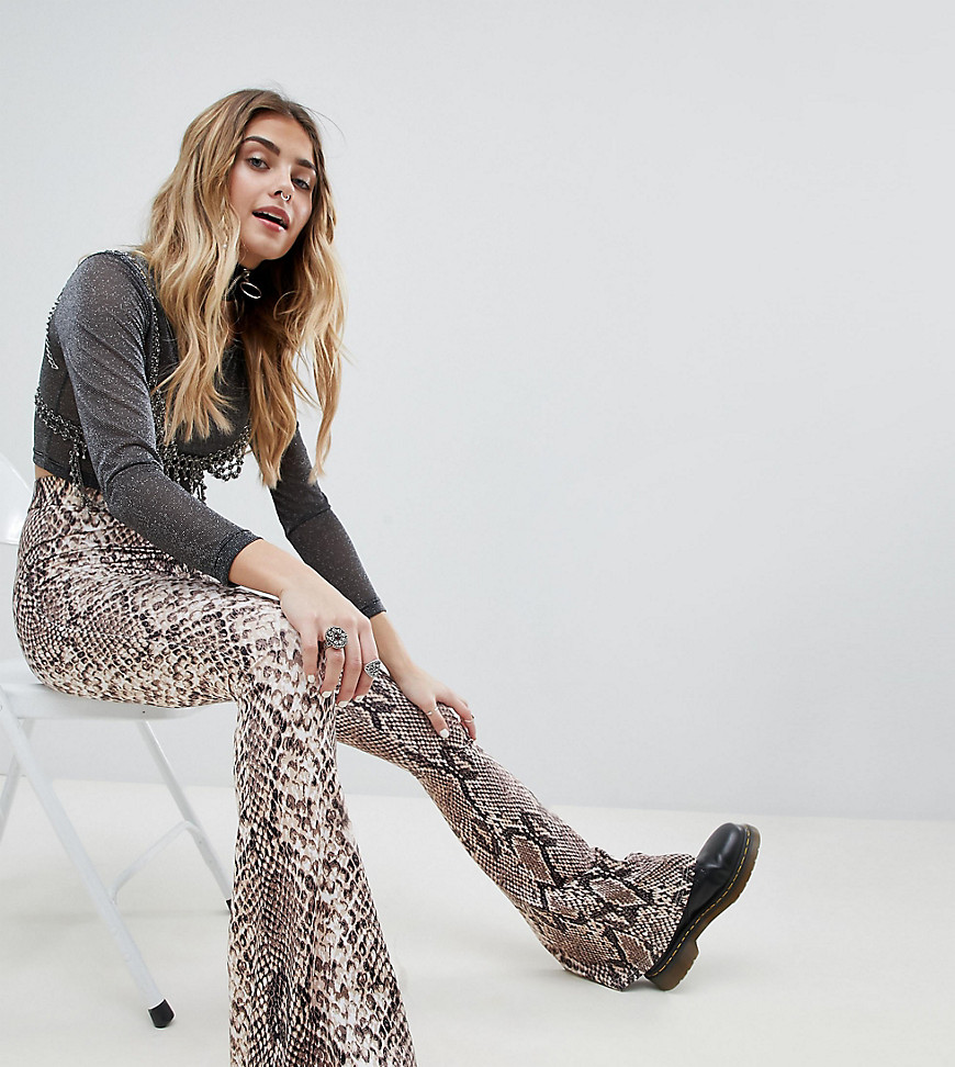 One Above Another Flare Trousers In Snake Print