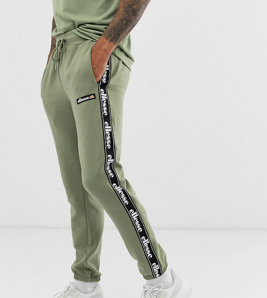 ellesse Jacopo recycled fleece joggers with taping in green exclusive at ASOS