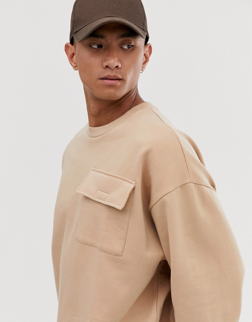 ASOS DESIGN oversized sweatshirt with utility chest pocket in beige