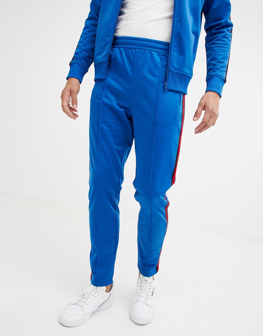United Colors Of Benetton track pants with taping in blue