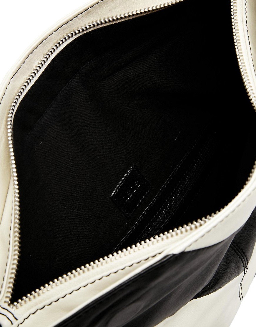 ASOS | ASOS PREMIUM Oversized Leather Striped Foldover Clutch Bag at ASOS