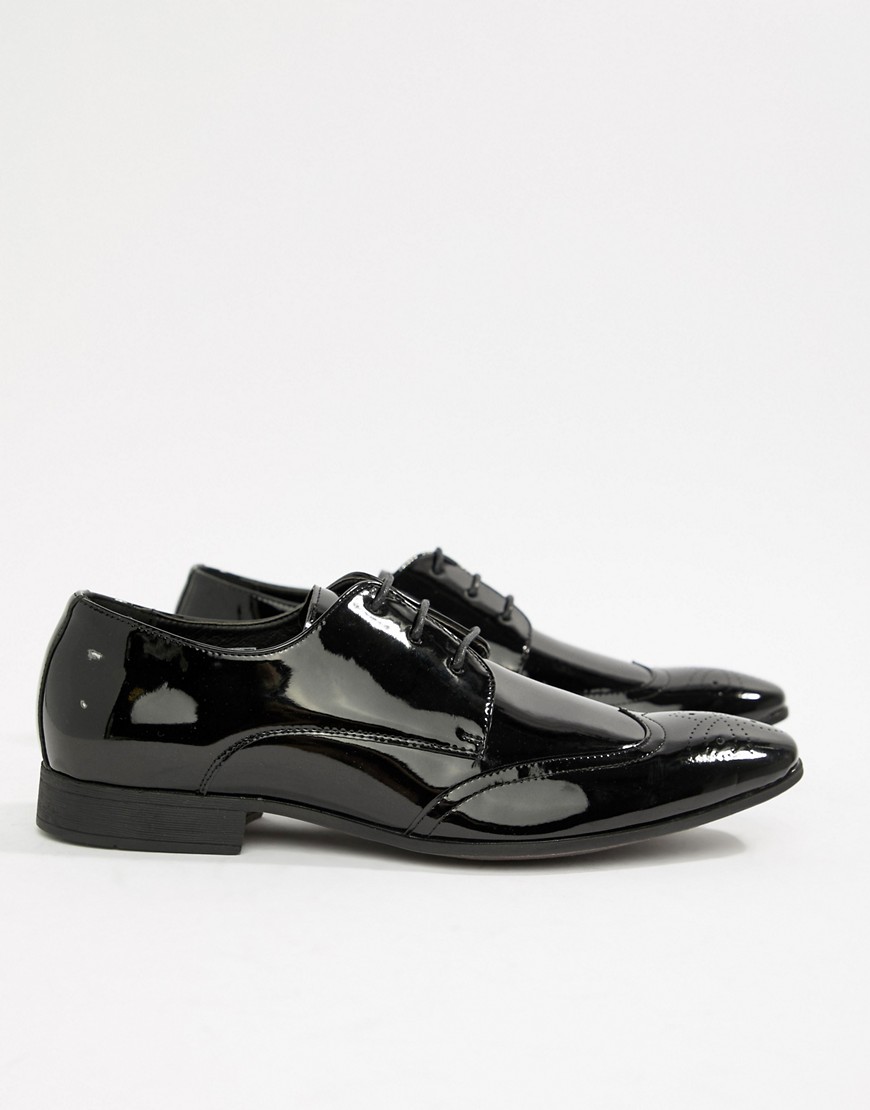 Moss London patent brogues in black