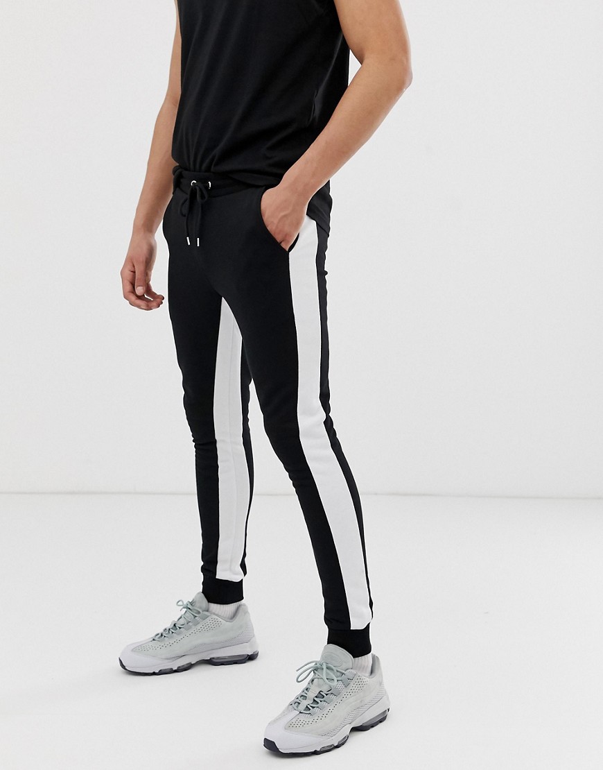 ASOS DESIGN super skinny joggers with side stripes in black