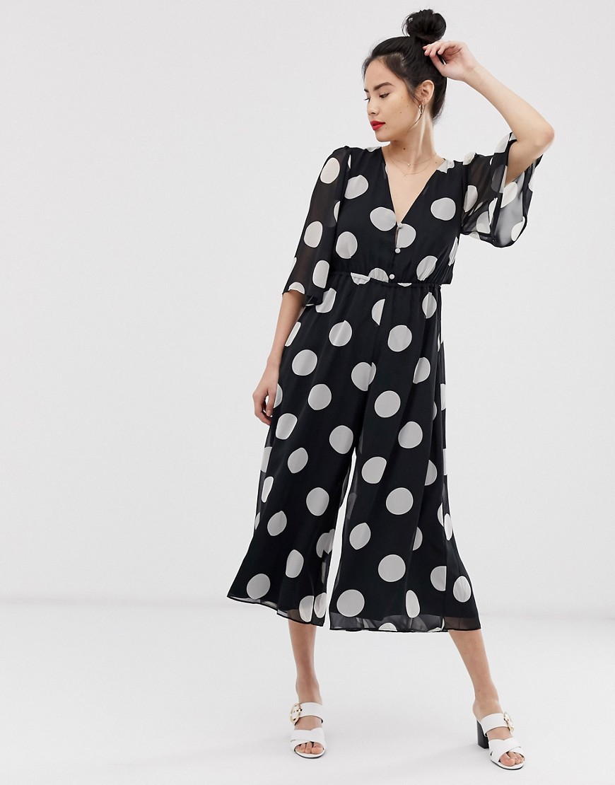 ASOS DESIGN button front waisted open back jumpsuit in spot print