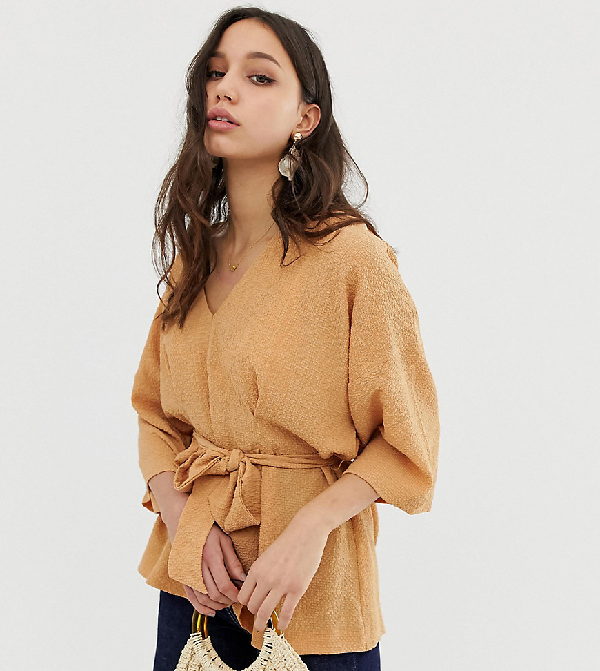 ASOS DESIGN Tall textured oversized top with v neck and tie waist