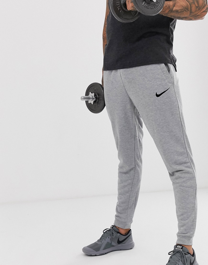 Nike Training tapered fleece pants in dark grey