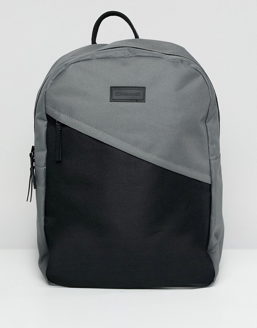 Consigned diagonal pocket backpack