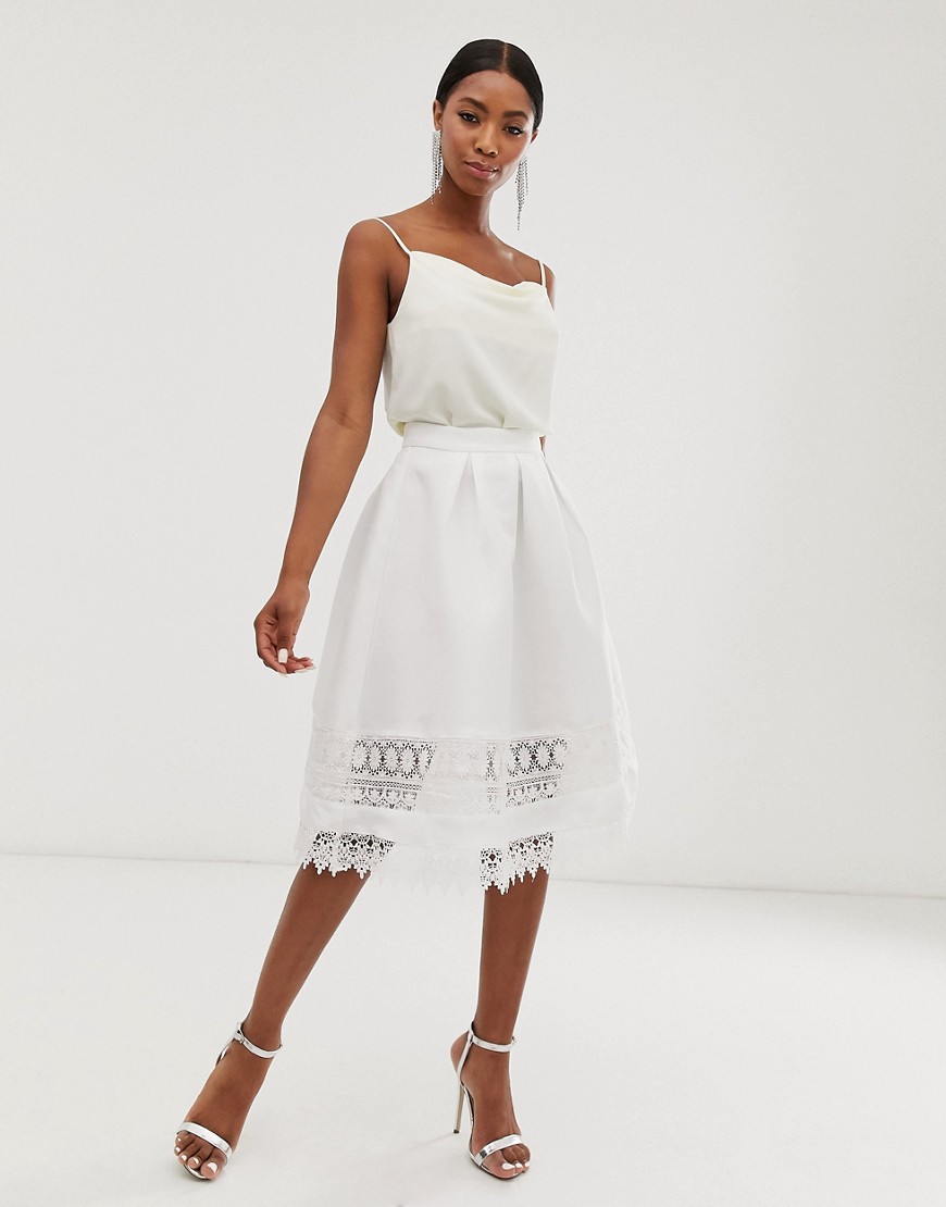Chi Chi London midi skirt with cut out lace detail in white