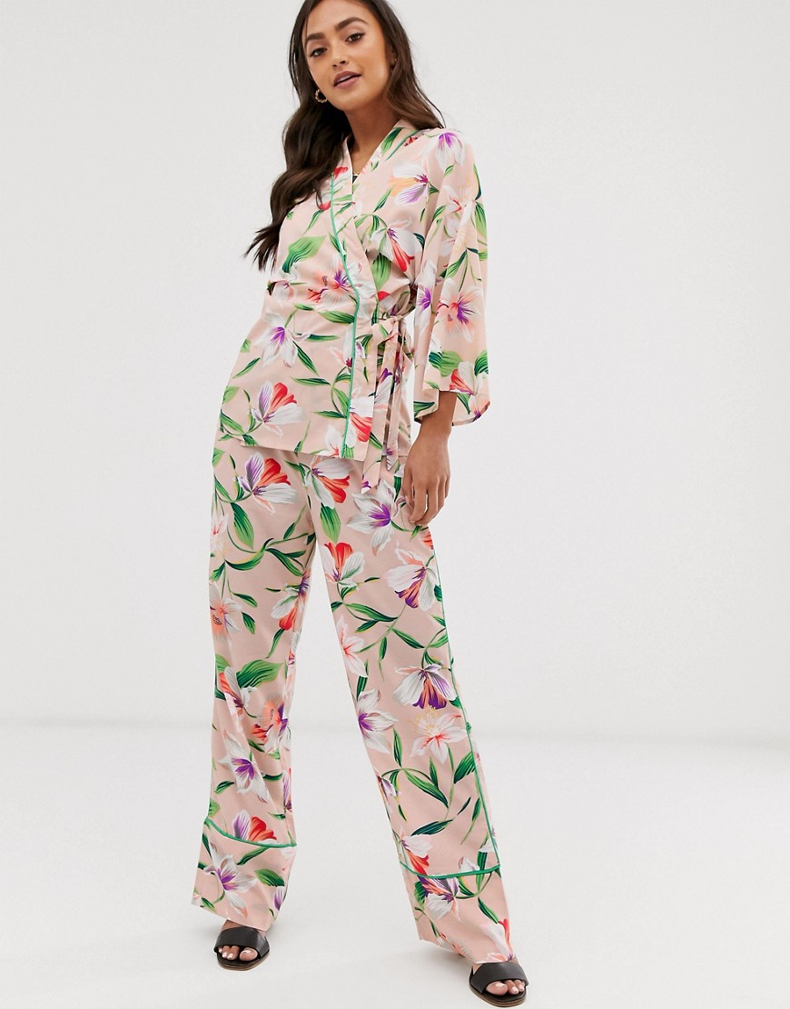 Liquorish wide leg trousers in floral print with green piping co ord