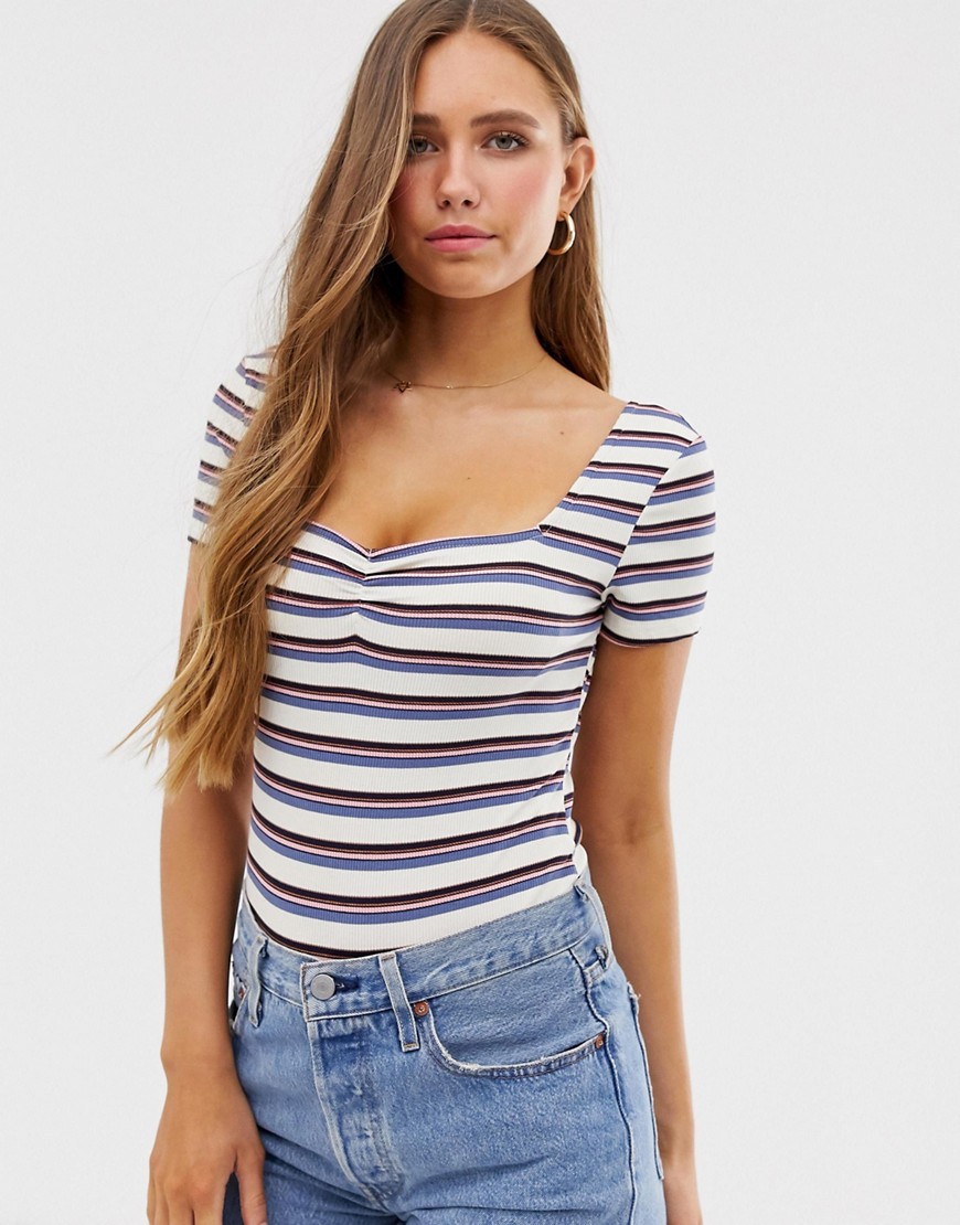 Glamorous body with ruched front in retro stripe