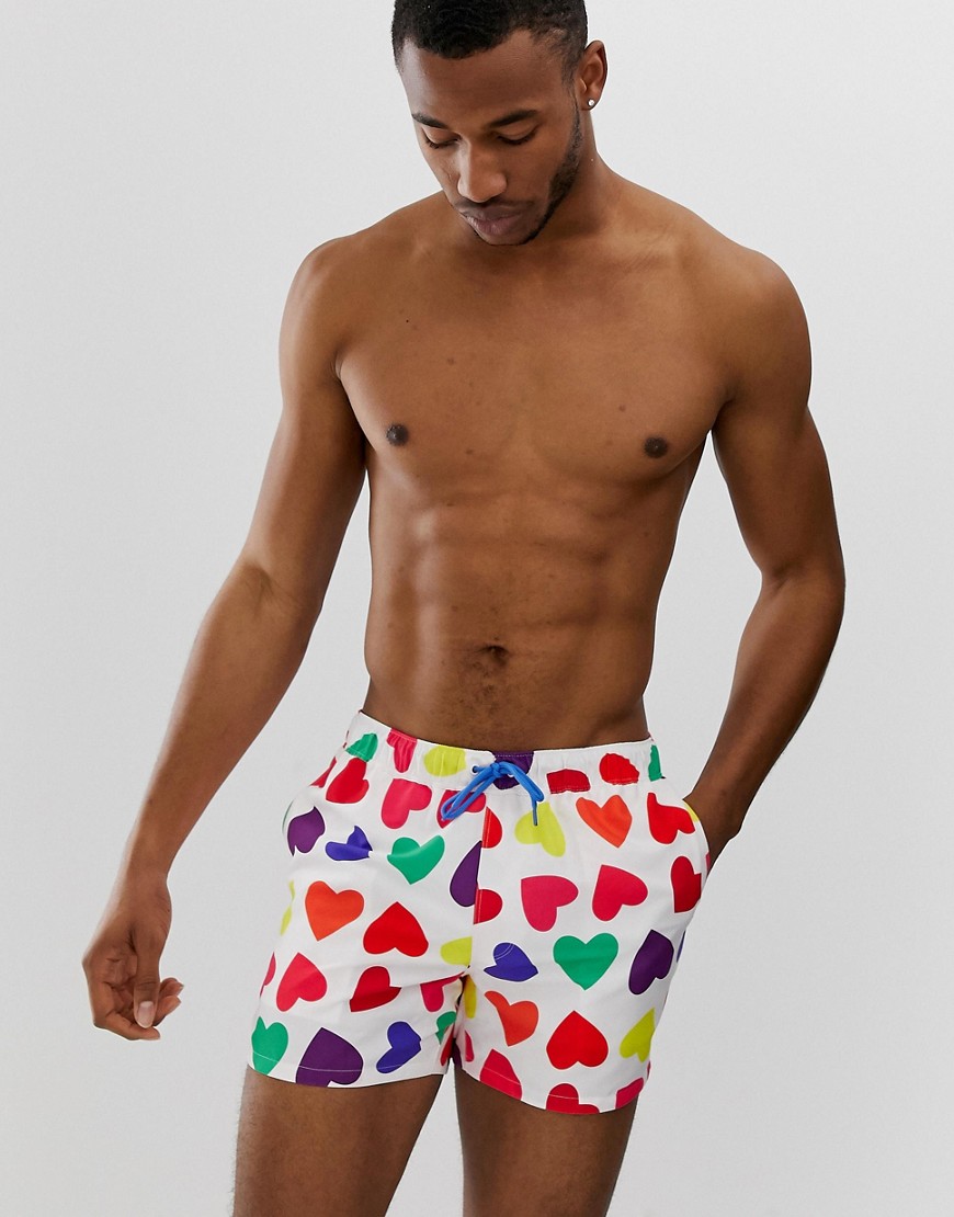 ASOS DESIGN swim shorts with multicoloured hearts in short length