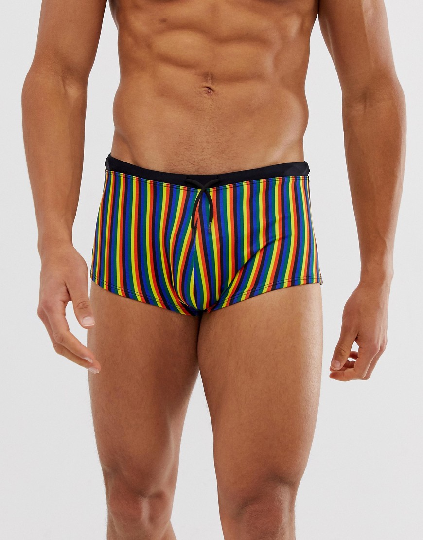 ASOS DESIGN swim trunks in rainbow print
