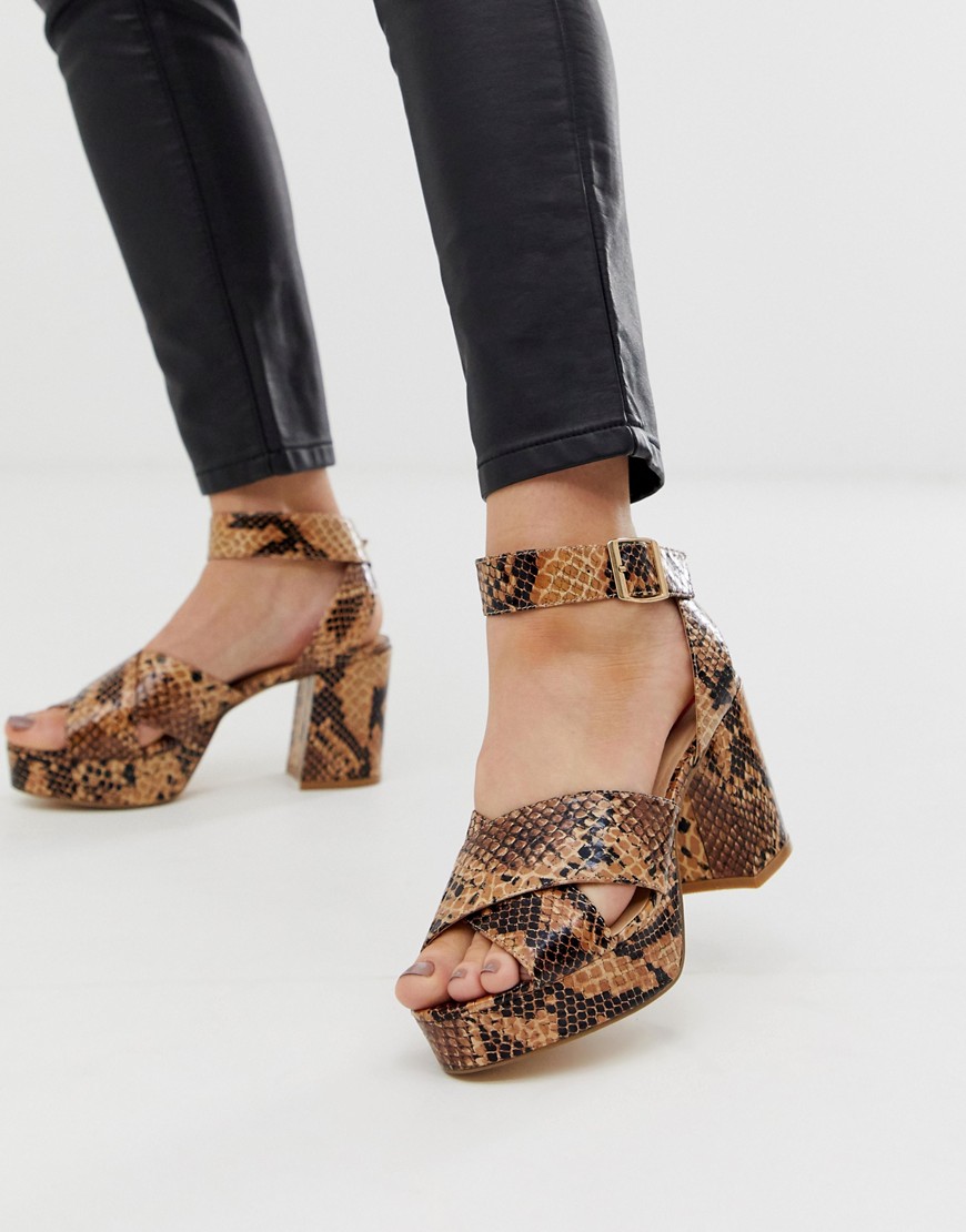 London Rebel platform heeled sandals in snake